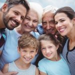 Happy multi-generation family standing  outdoors