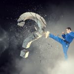 Karate man in action. Mixed media