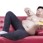 Obese man eats fast food 2