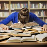 Student Studying Hard Exam, Sleeping on Books Read in Library
